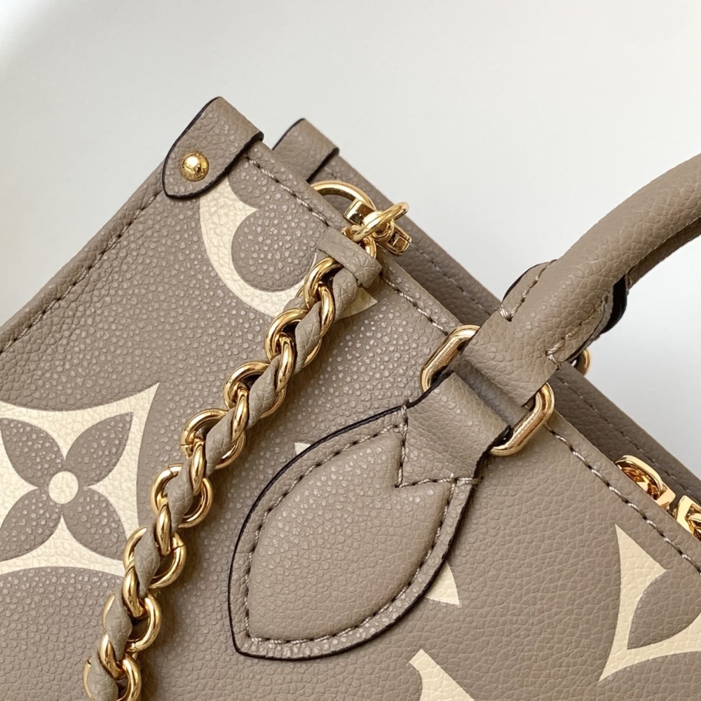 Louis Vuitton Onthego East West Monogram Empreinte Handbag Bicolor Beige 25Cm M23641 - Image 6