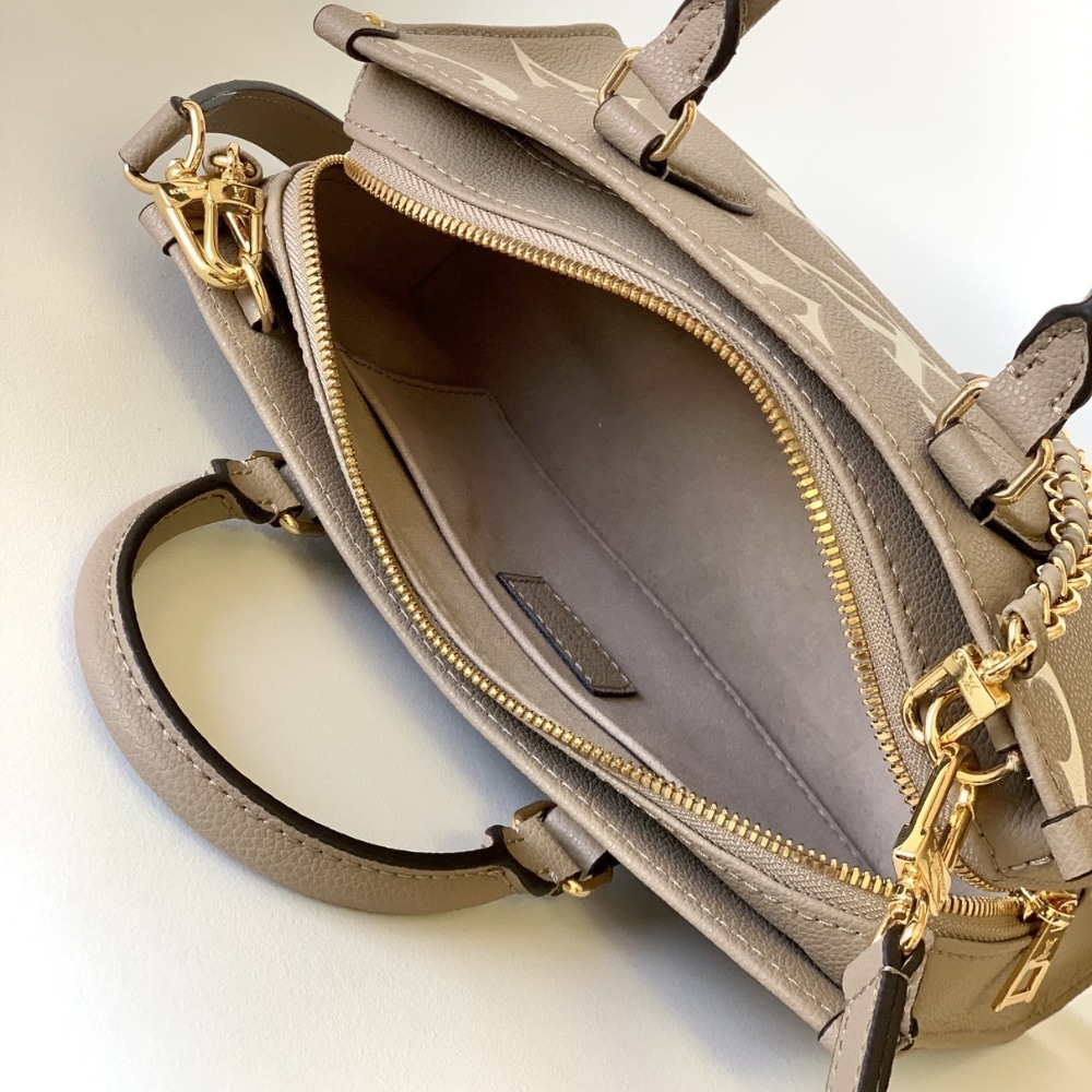 Louis Vuitton Onthego East West Monogram Empreinte Handbag Bicolor Beige 25Cm M23641 - Image 8