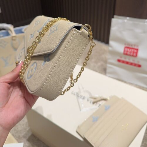 Alternative view of Louis Vuitton Félicie Pochette Monogram Empreinte Crossbody Bag Candy Blue 21Cm M83025