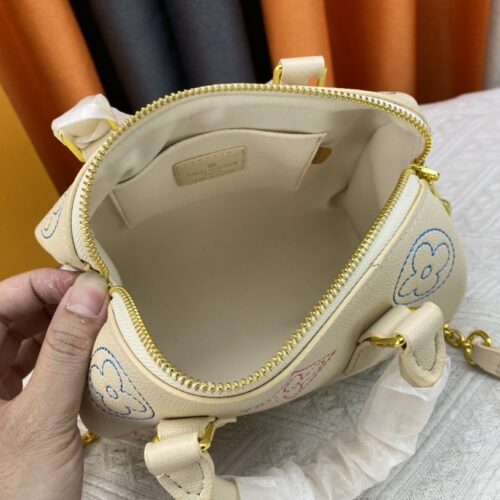 Alternative view of Louis Vuitton Speedy Bandoulière 20 Monogram Empreinte Handle Bag Crème Beige 20Cm M46667