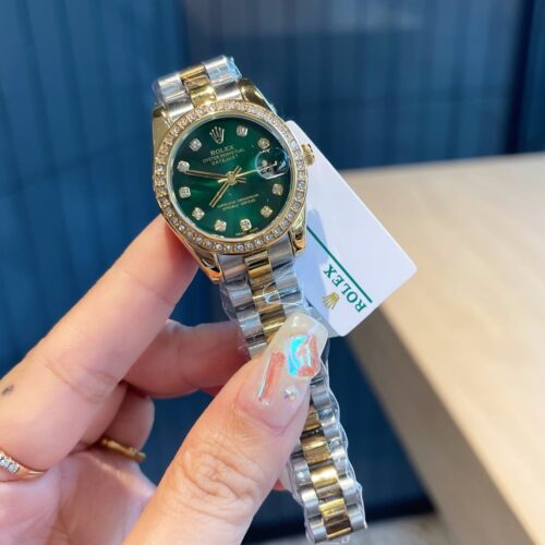 Alternative view of Rolex Datejust 28 Oyster Oystersteel Yellow Gold And Green 28Mm