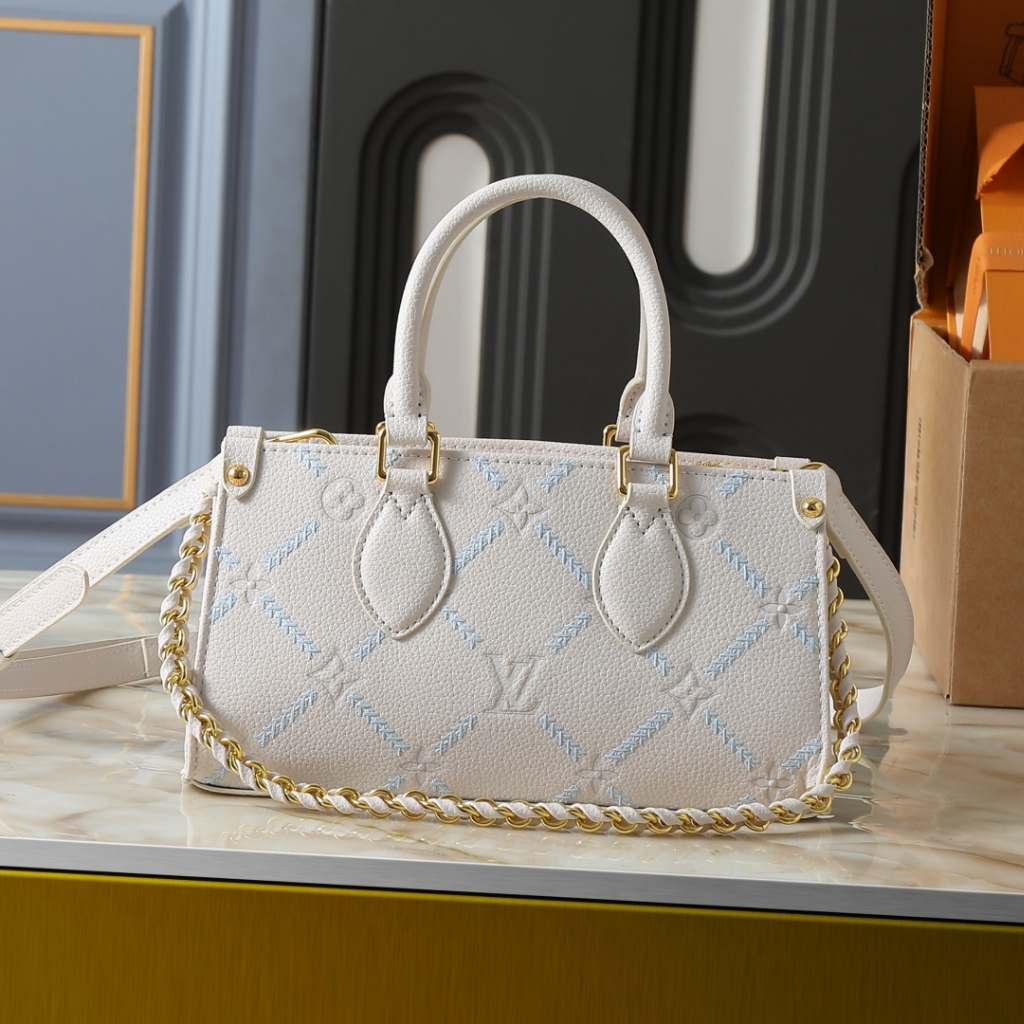 Louis Vuitton Onthego East West Monogram Empreint Couturee Handbag Ivory 25cm M29487 - Image 2