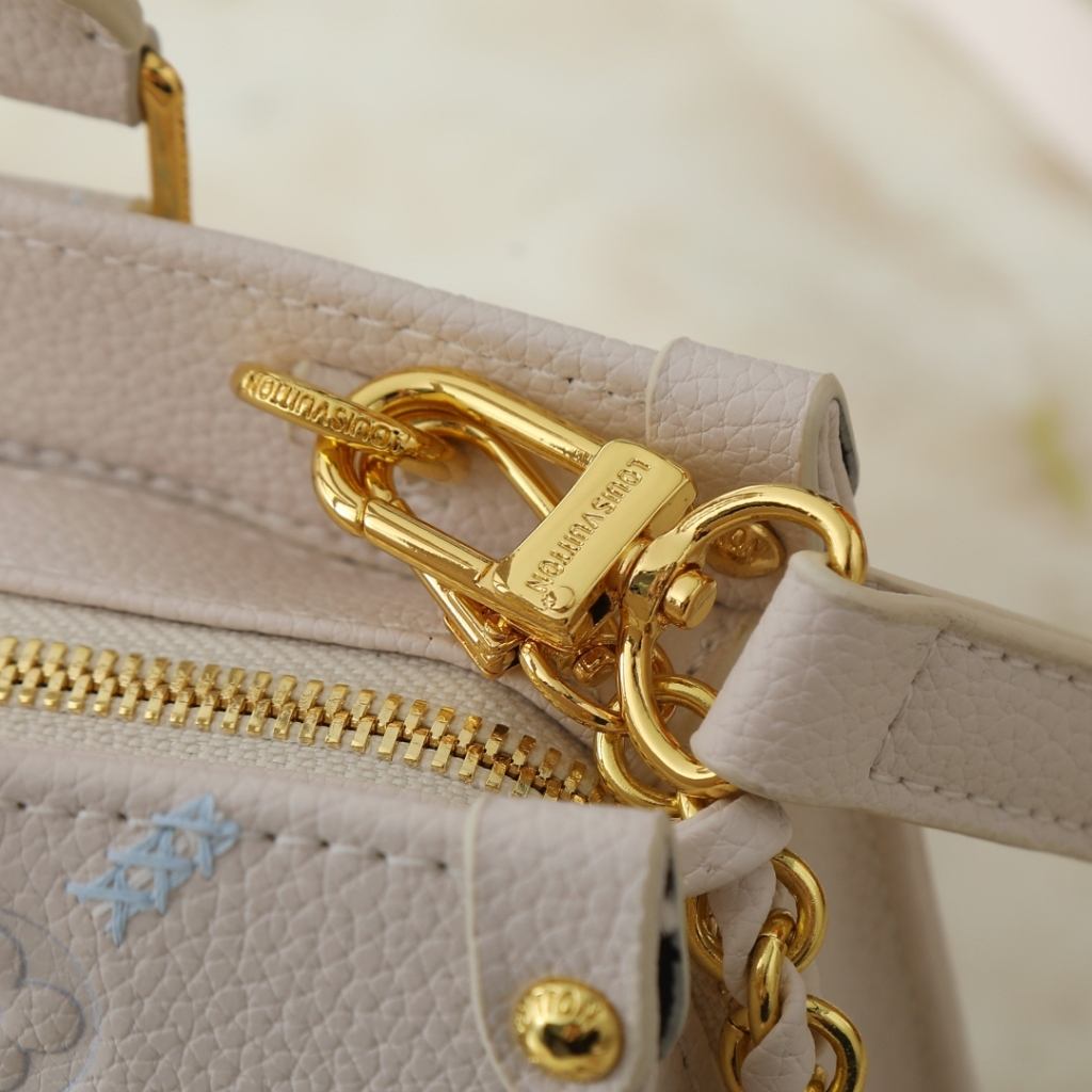 Louis Vuitton Onthego East West Monogram Empreint Couturee Handbag Ivory 25cm M29487 - Image 5